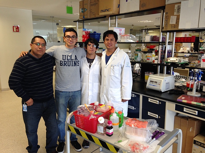 touring the MX Natl Inst. of Genomic Medicine with PI Dr. Rafael Velacruz (left).jpg